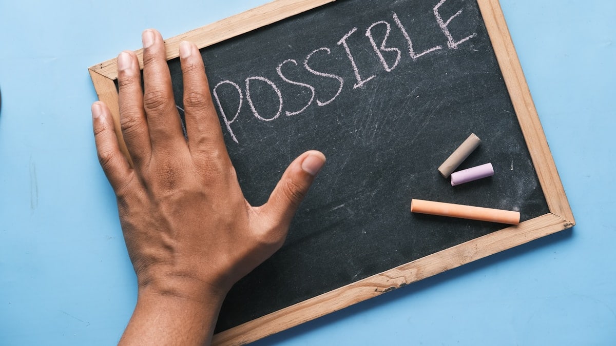 a chalkboard with the word possible written on it